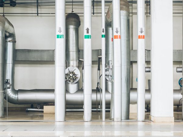 steel pipelines and cables in a plant,Industrial zone.